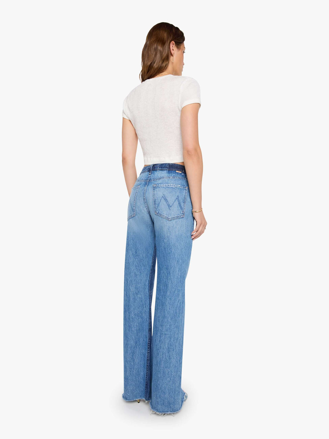 The Bookie Slit Twist Heel Fray Jeans in Double Take