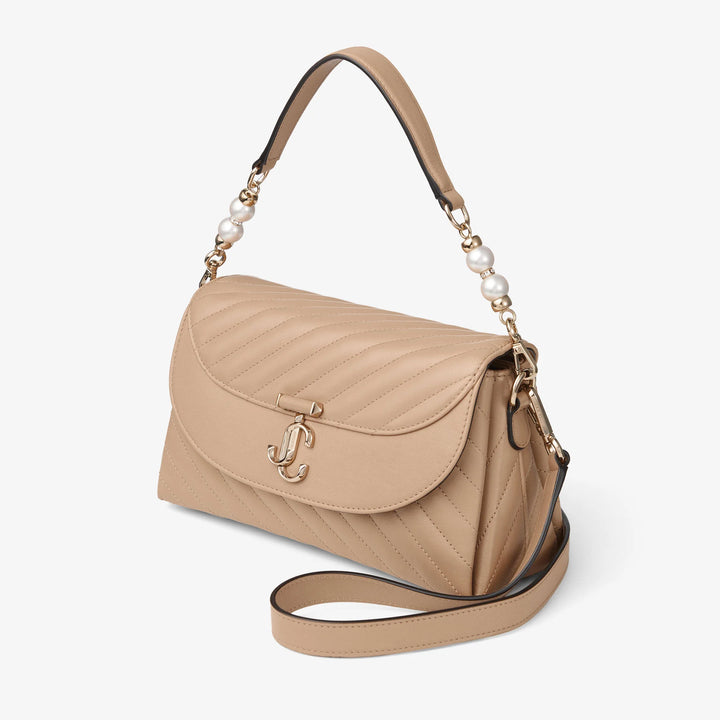 Curve Quilted Top Handle Bag