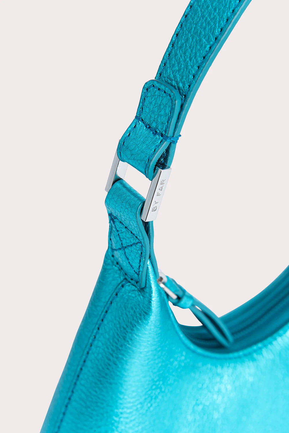 BABY AMBER METALLIC LEATHER HANDBAG - aqua